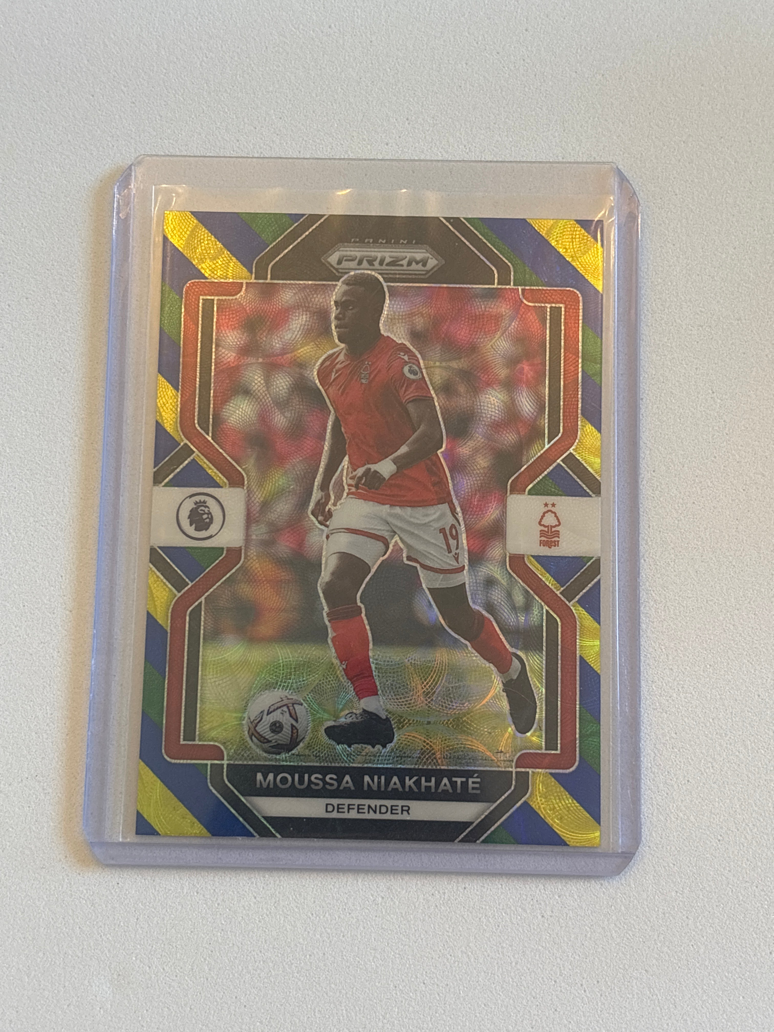 Niakhate - Blue/Yellow/Green Choice Prizm