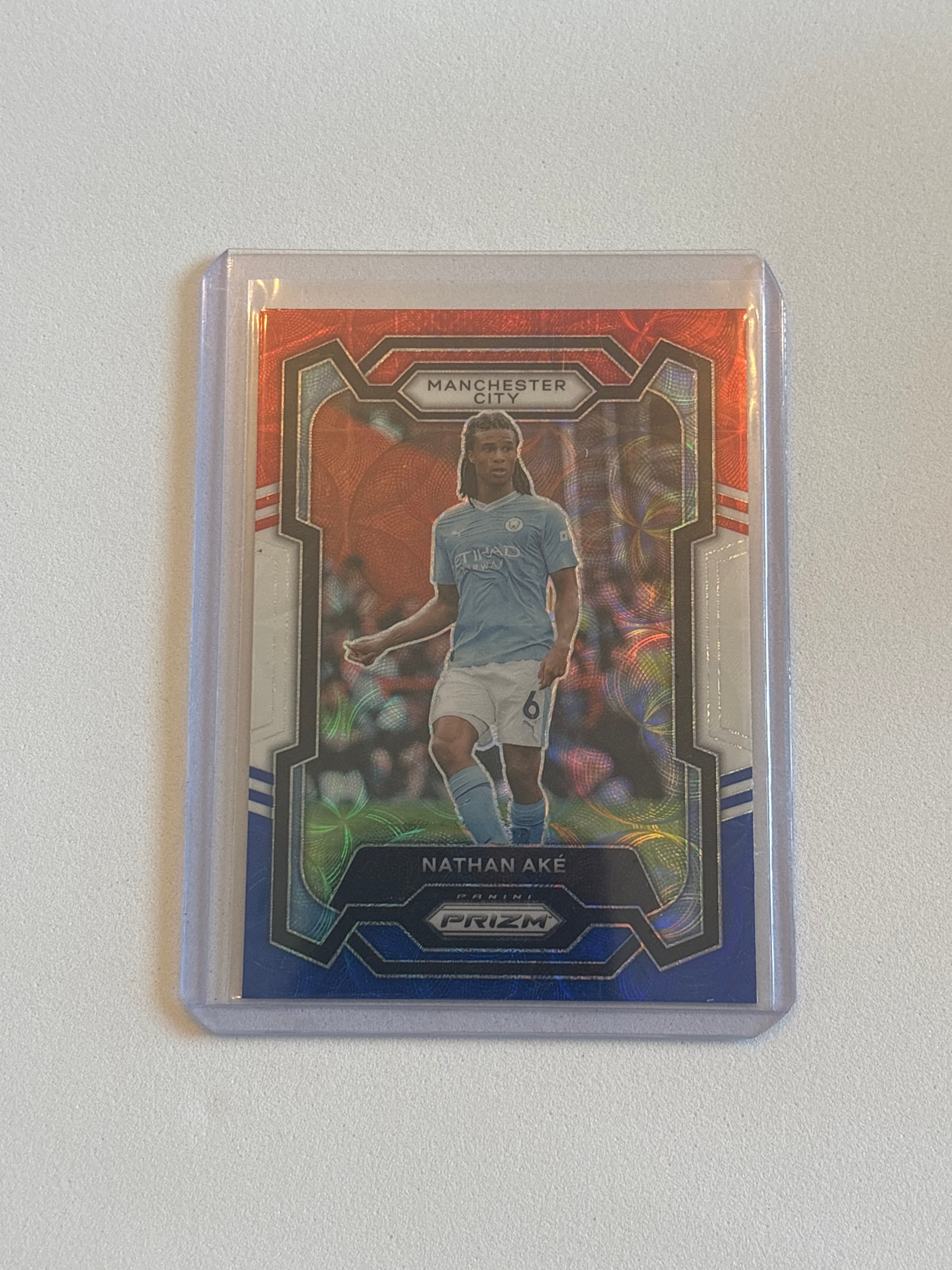 Ake- Red/White/Blue Choice Prizm